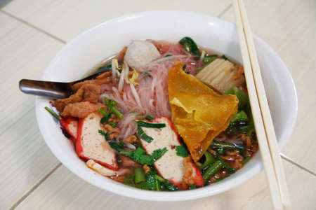tasty of Yentafo soup noodles in bowl on white floorの写真素材