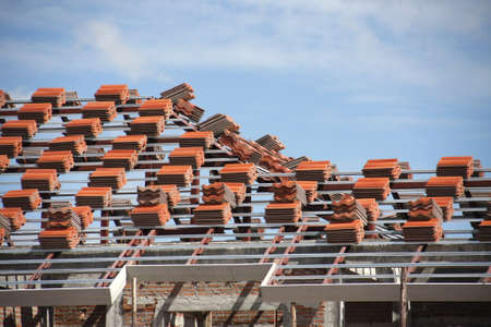 Preparation red tile on roof structure for roofingの写真素材