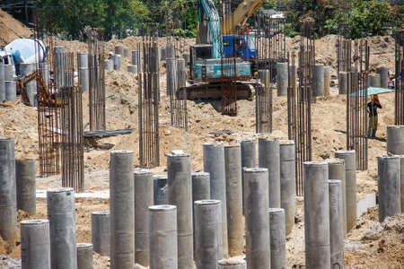 foundation concrete pile was hammered into the ground for base construction