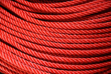 roll texture of red nylon ropeの写真素材