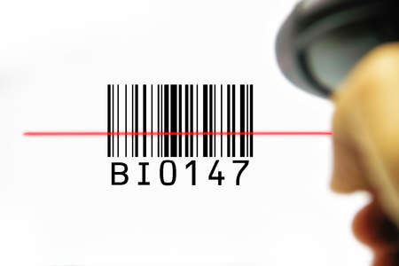 scanner scanning barcode on with background for business sale and customer buyの写真素材