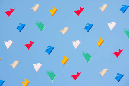 colorful flick flag on blue sky, celebrities symbolの写真素材