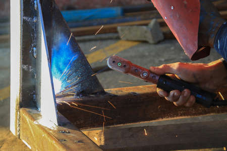 welding steel iron with blue smoke