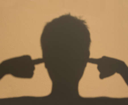 shadow man do not want listen, noise loudの写真素材