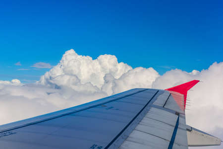 Clouds in sky view from aircraft window.の写真素材