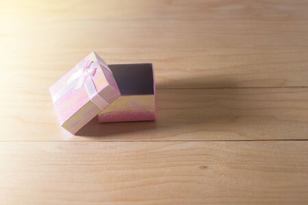 Gift box wrapped Christmas and Newyear presents with bows and ribbons, Christmas frame boxing day background and bannerの写真素材