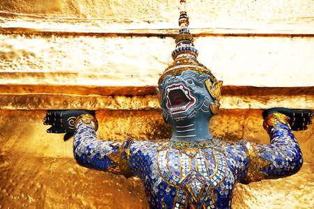 Golden statue at Grand Palace Wat Phra Kaeo Bangkok Thailand