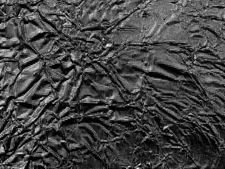 Crumpled paper in black and white background