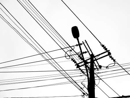 Electricity post on black and white backgroundの写真素材
