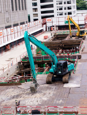 large track excavator work in construction site