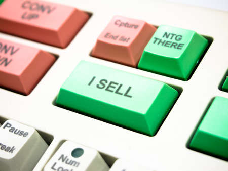 sell button key on investment keyboardの写真素材
