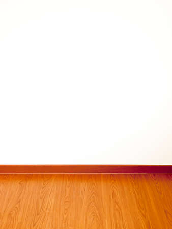 Empty white wall and wooden floor