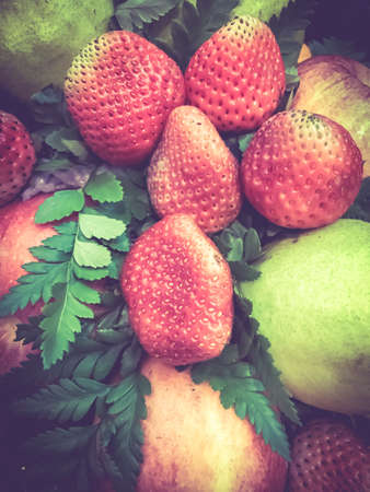 strawberries on basket vintage color backgroundの写真素材
