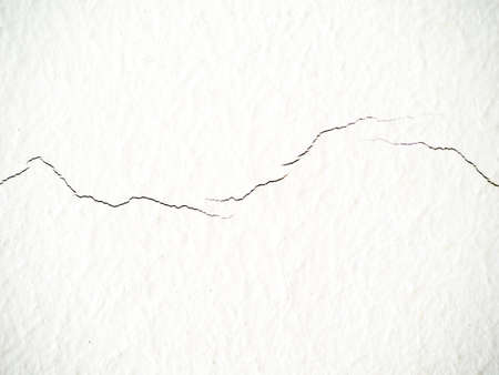 abstract background white wall with cracksの写真素材