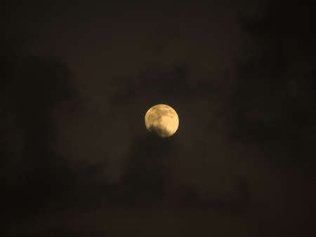 Full moon on black color backgroundの写真素材