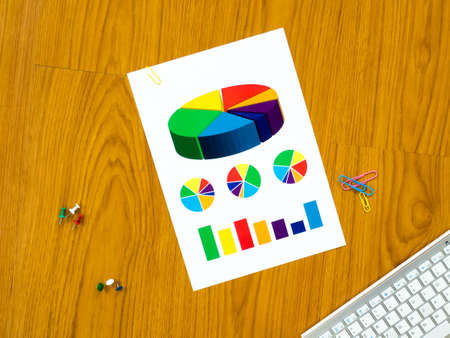 Top view of office desk with paper backgroundの写真素材