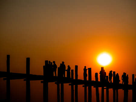 the silhouette peple on U-bein bridge in Mandalayの写真素材