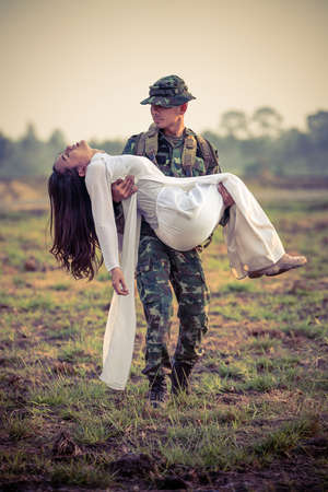 Love of soldier and a vietnamese womanの写真素材