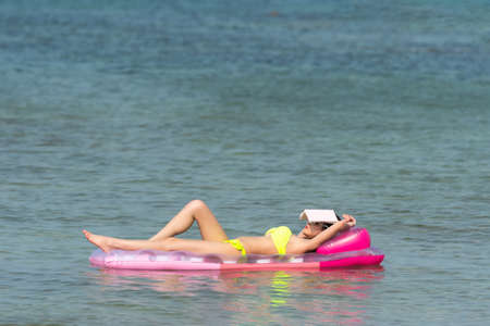 Portrait of woman posing outdoors at the sea beach