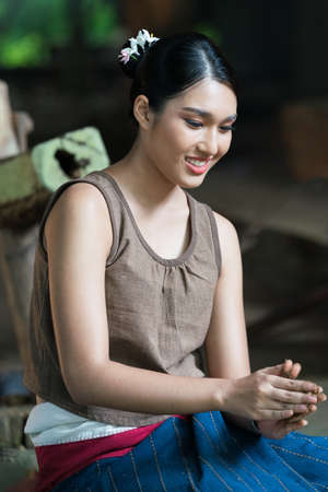Portrait of Thai Woman In Traditional Costume with elephantの写真素材