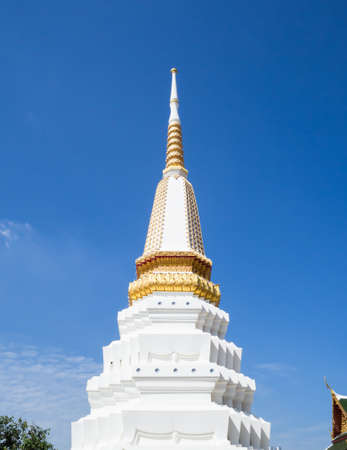 thailand public temple and white pagoda on blue skyの写真素材