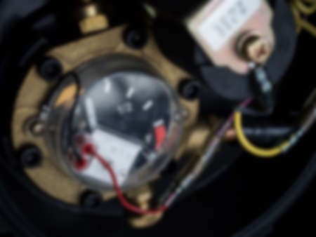 oil gas gauge low scale with electic line blur backgroundの写真素材