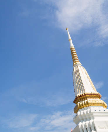 thailand public temple and white pagoda on blue skyの写真素材