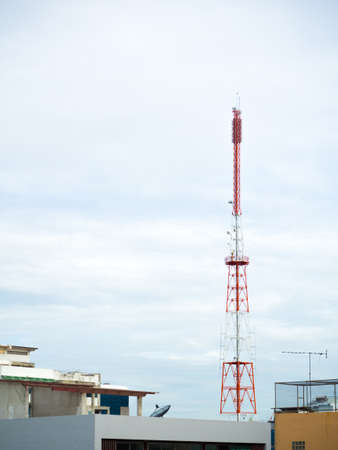 signal tower on blue sky and cloudy backgroundの写真素材