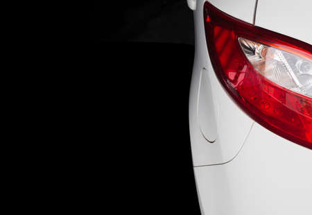 red taillight of a car on black backgroundの写真素材