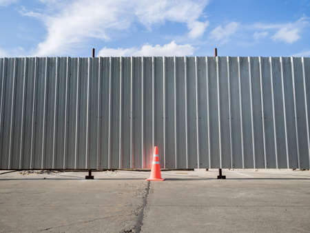 under construction on blue sky backgroundの写真素材