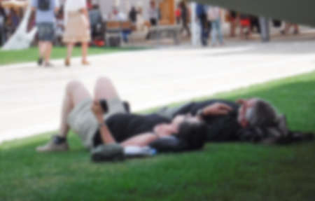 people relax in park, Milano Expo Italy on  blur backgroundの写真素材