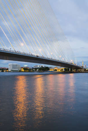 the bridge construction on twilight and river reflection at night, Rama 8 Bridge: Thailandの写真素材