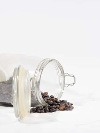 coffee bean in bottle isolated white backgroundの写真素材