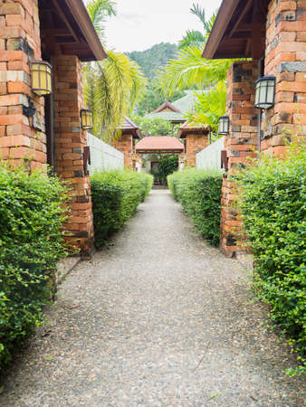 walkway  in garden at resort on white skyの写真素材