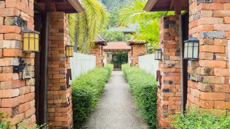 walkway  in garden at resort on white skyの写真素材