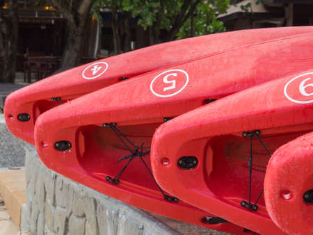 Canoes on beach at Railay beach Krabi, Thailandの写真素材