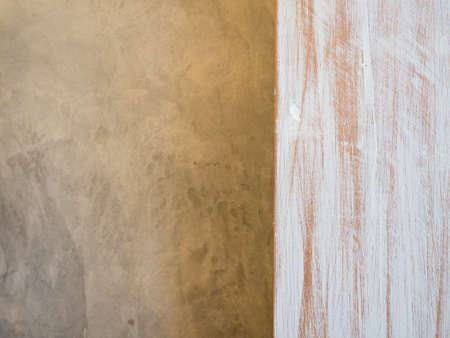 brown wood and cement wall in loft style backgroundの写真素材