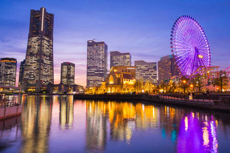 Cityscape of Yokohama, Minato mirai 21 colorful lighting from building in twilightのeditorial素材
