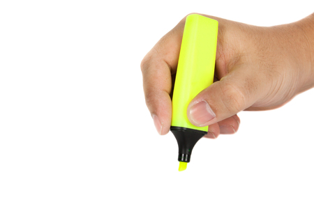 Hand hold a highlight pen writing somethingの写真素材