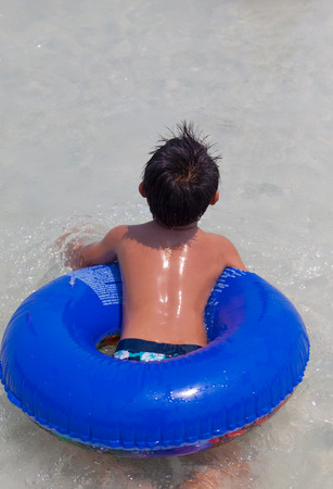 Boy going to swimの写真素材