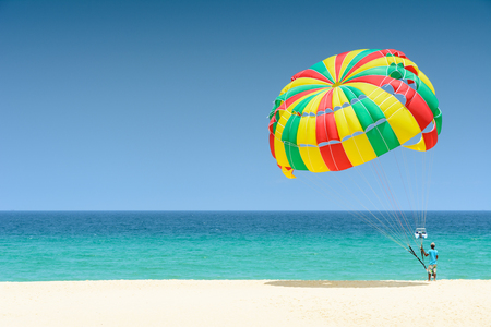 Parachute for tourist on sand beachの写真素材