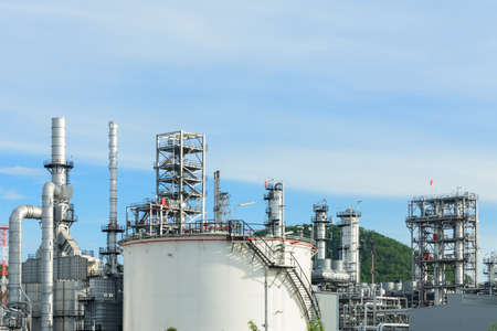 Oil tank at refinery in morning lightの写真素材