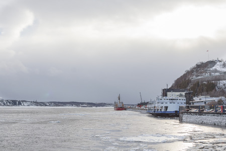 Ships on Saint Lawrence river in winterの写真素材