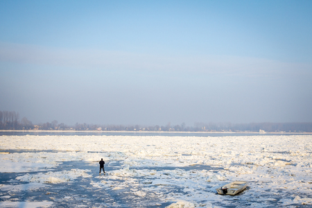 BELGRADE, SERBIA - JANUARY 21, 2016: People walking on to the frozen Danube, due to year exceptionnaly cold weather over the Balkans lasting for more than 10 daysのeditorial素材