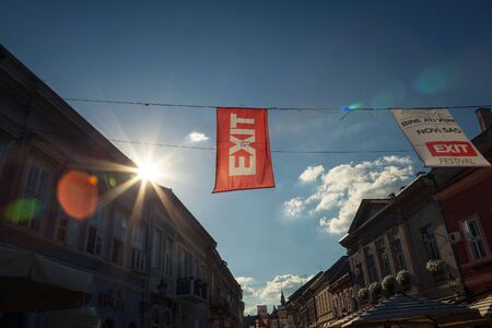 NOVI SAD, SERBIA - JUNE 11, 2017: Banners and flag in Novi Sad main streets announcing the upcoming Exit festival, held every year in the city, one of the biggest music festival in Balkans

Pictures of flags promoting Exit Festival, one of the most famousのeditorial素材