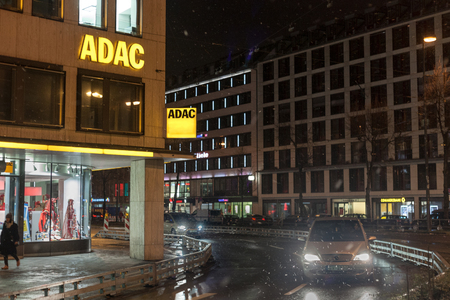MUNICH, GERMANY - DECEMBER 17, 2017: ADAC logo on their downtown Munich main office taken during a snowy night. The ADAC is the main Automobile club in Germany

Picture of the Munich ADAC office at night. The ADAC, or Allgemeiner Deutscher Automobil-Club のeditorial素材