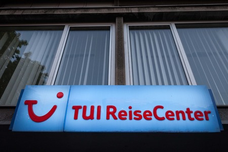 BELGRADE, SERBIA - APRIL 21, 2018: Logo of TUI on their local Reisecenter (Travel Center). TUI Group, or Touristik Union International is a travel and tourism company headquartered in Germanyのeditorial素材