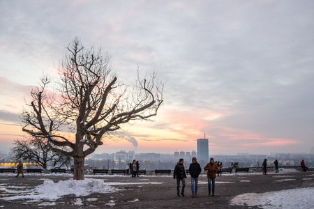 BELGRADE, SERBIA - JANUARY 1, 2015: people walking facing New Belgrade (Novi Beograd) from Kalemegdan fortress, one of the main monuments of Belgrade, during a winter ice cold afternoonのeditorial素材