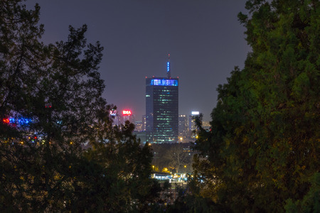BELGRADE, SERBIA - MARCH 21, 2015: Skyline of New Belgrade (Novi Beograd) seen by night from the Kalemegdan fortress. The main landmarks of the district, such as Usce can be seenのeditorial素材