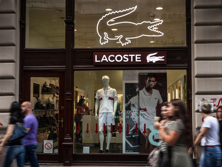 BELGRADE, SERBIA - JULY 8, 2018: Logo of Lacoste on their main store for Belgrade. Lacoste is a...